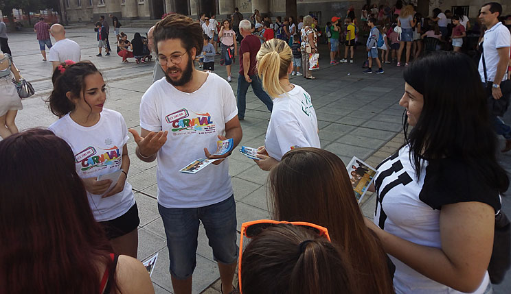 Volunteers advertising the carnival on the street